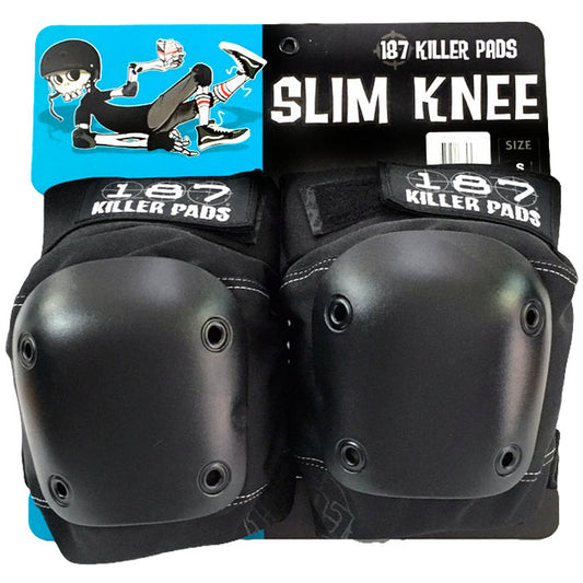 The 187 Killer Pads - Slim Knee Pads (Black) by Sunshine Rollers feature a durable ballistic nylon construction, black protective gear accented with metal rivets, and adorned with a cartoon skeleton on a blue label.