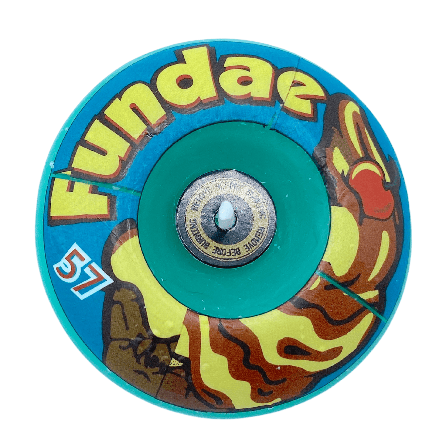 Introducing the Moxi - Fundae Skate/Sk8 Candle by Sunshine Rollers, a retro-style yo-yo in a vibrant blue and brown design. It showcases the word "Fundae" in bold yellow letters at the top, alongside a graphic of a banana split with chocolate syrup. Just like nostalgic skate wax, it features the number 57 on the lower left.