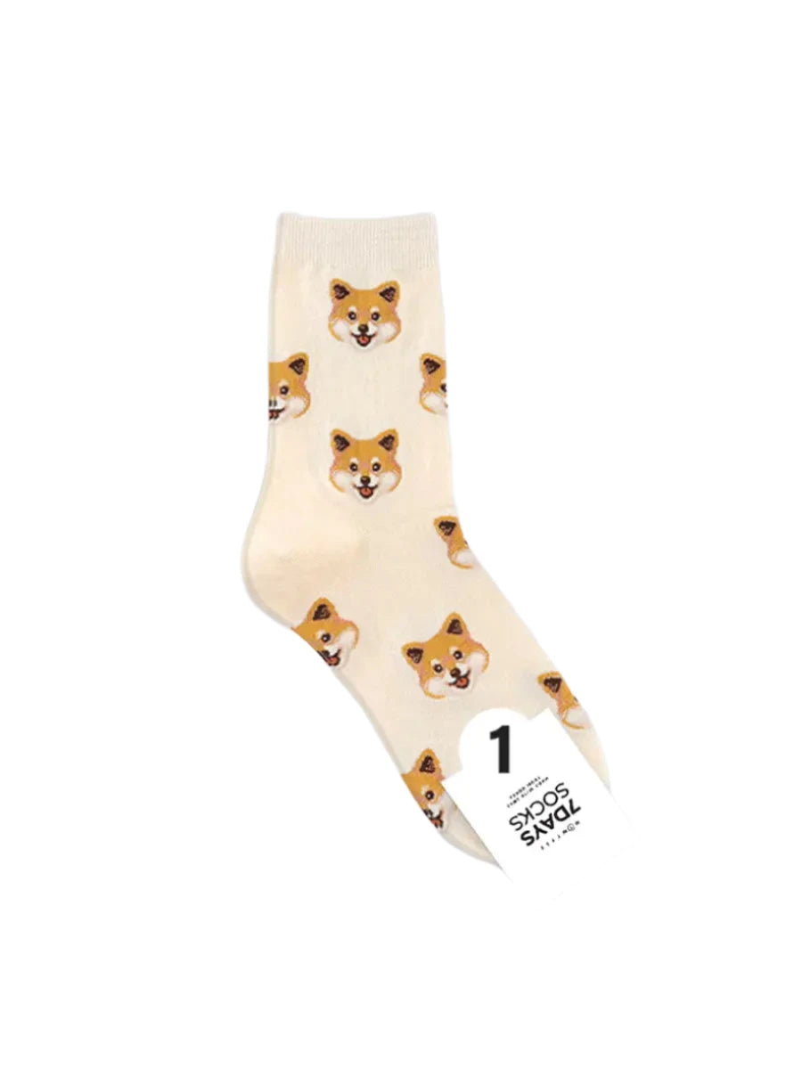 Beige sock with dog pattern on a white background