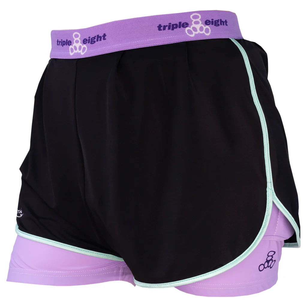 Black athletic shorts with purple waistband and inner lining on a white background