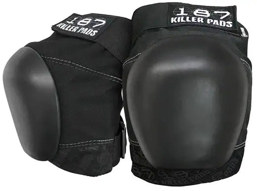 A pair of Sunshine Rollers' 187 Killer Pads - Pro Knee Pads in black, showcasing hard protective caps with the famous logo positioned at the top. These knee pads provide outstanding protection with hook-and-loop fastening straps to ensure a secure fit during any activity.