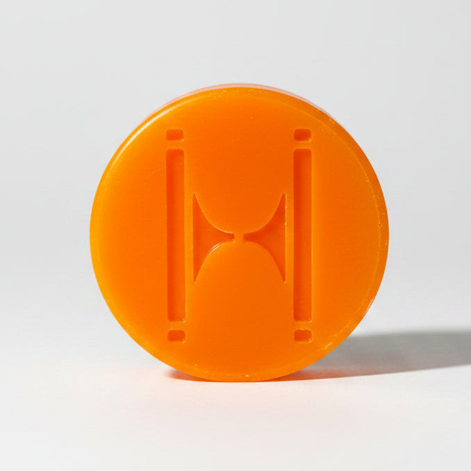 Huck-Skate-Supply-Puck-Roller-Skate-Grind-Wax-Orange