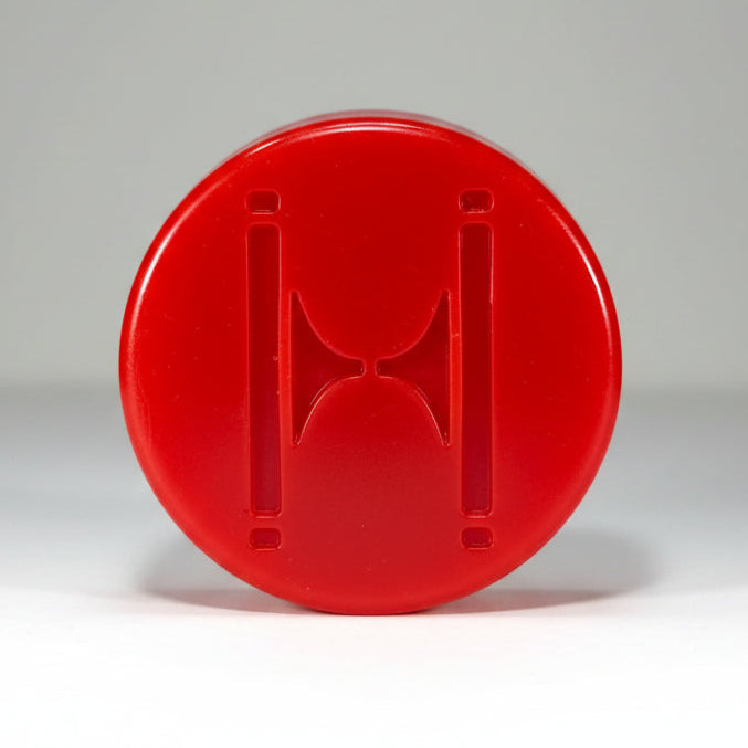 Huck-Skate-Supply-Puck-Roller-Skate-Grind-Wax-Red
