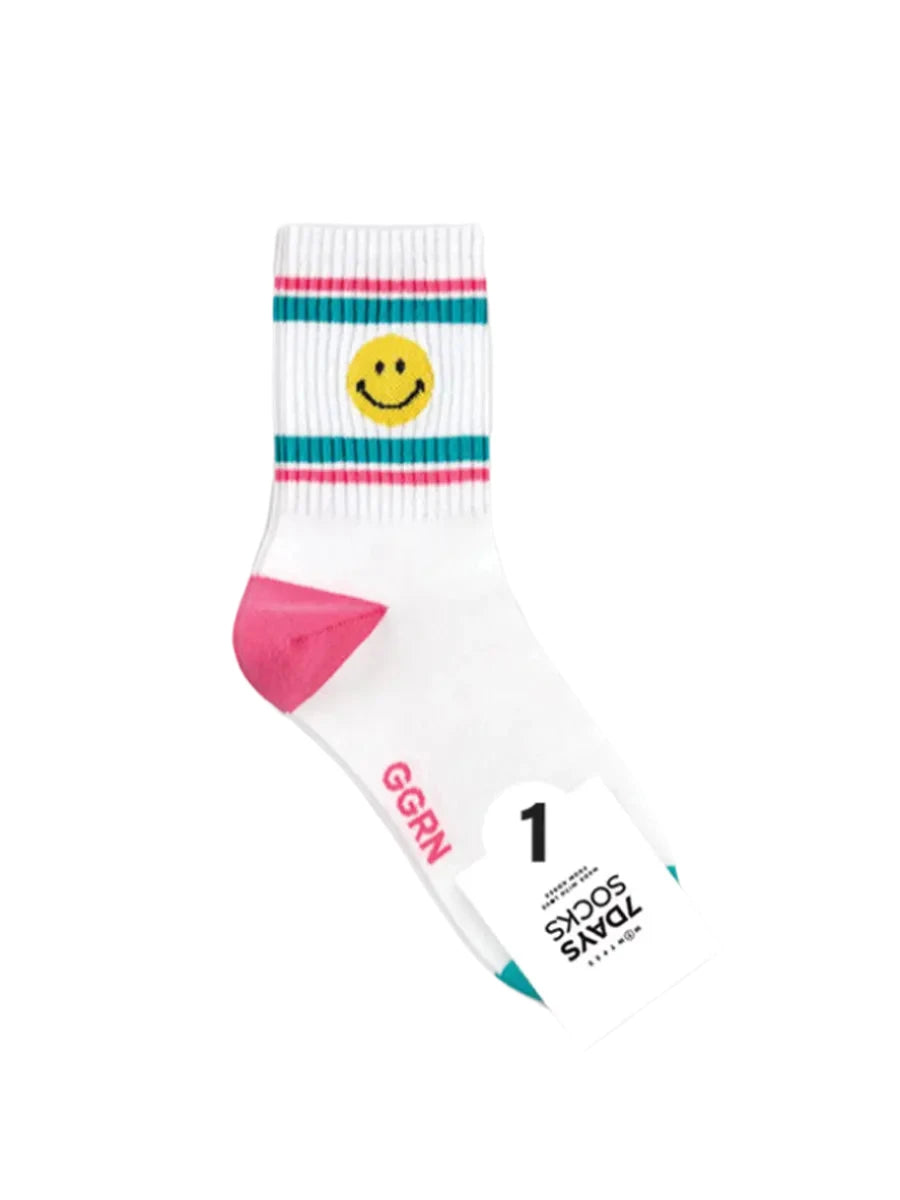 White sock with colorful design and smiley face on a white background