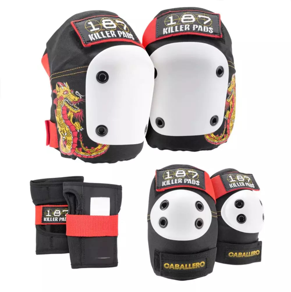 The 187 Killer Pads - Adult 6 Piece Combo Pack (Steve Caballero) by Sunshine Rollers showcases a striking set of protective gear. The knee and elbow pads are black with white caps and red accents, featuring a bold Cab Dragon design for an extra fierce touch. Both pairs prominently display the 187 Killer Pads logo, with wrist guards completing this comprehensive set.